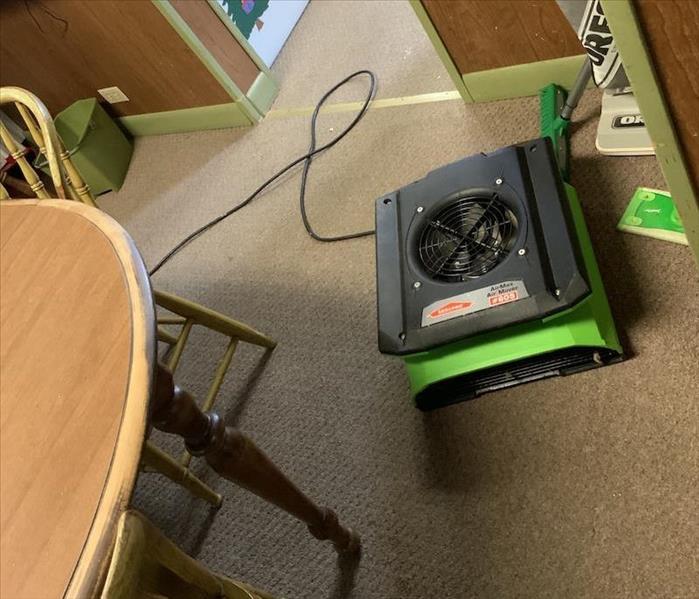 SERVPRO equipment at work in living room.