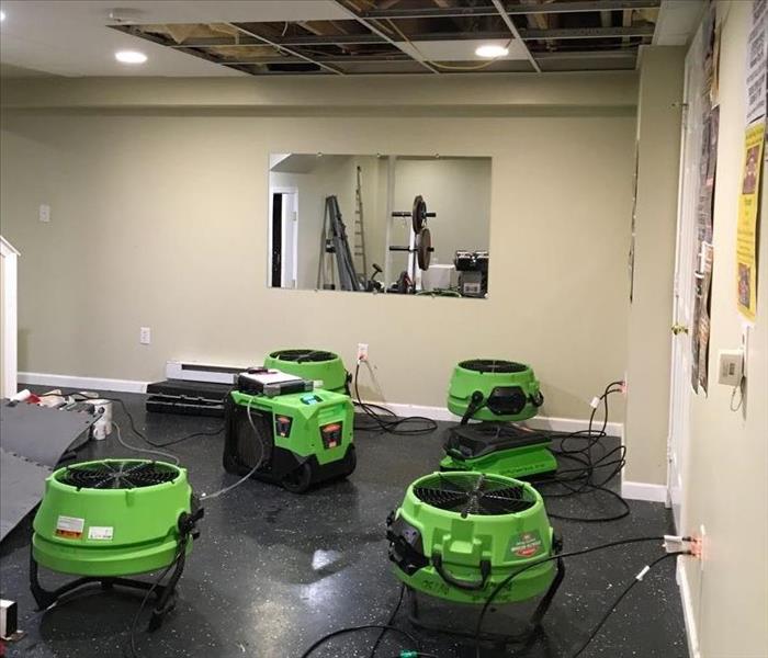 SERVPRO equipment in a work out room. 